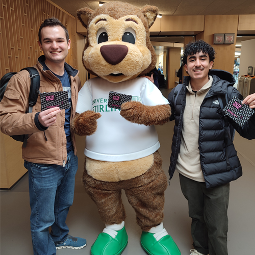 image of students with University squirrel encouraging people to vote